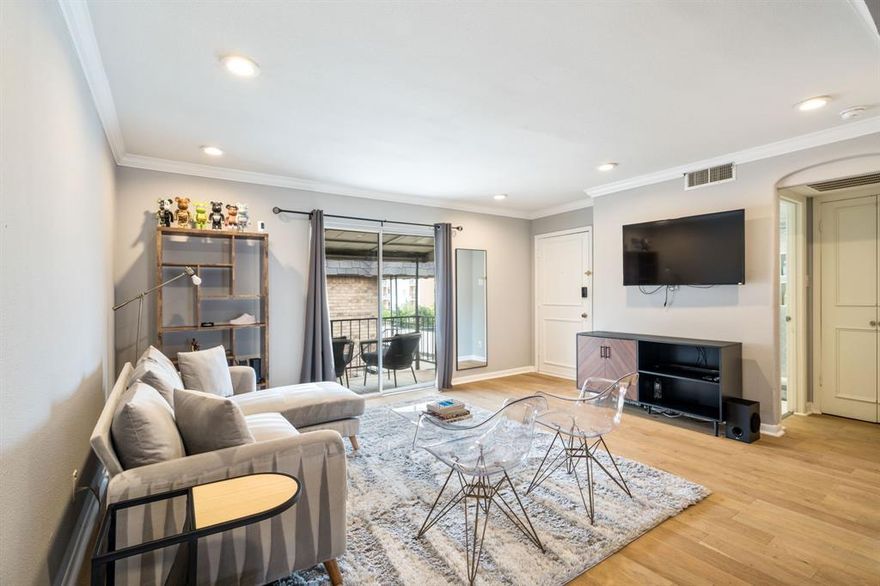Fully updated and thoughtfully designed, this refined condo blends modern finishes with effortless everyday living. White oak hardwood floors flow throughout the space, creating a warm and cohesive foundation, while clean lines and curated details elevate the overall aesthetic.
The kitchen is both functional and inviting, featuring sleek quartz countertops, prep space, and a layout that opens seamlessly into the living and dining areas—ideal for both quiet evenings and entertaining. The bedroom offers a spacious retreat with two walk-in closets, providing exceptional storage and flexibility. The beautifully updated bathroom showcases contemporary finishes and a clean, timeless design.
Located within a gated community, this residence offers both privacy and convenience, with a community pool just steps from the unit—perfect for relaxing on warm Texas days. One covered parking space adds ease to daily living. A well-appointed home that combines style, comfort, and a prime setting. Seller is open to selling all furniture items in the home.