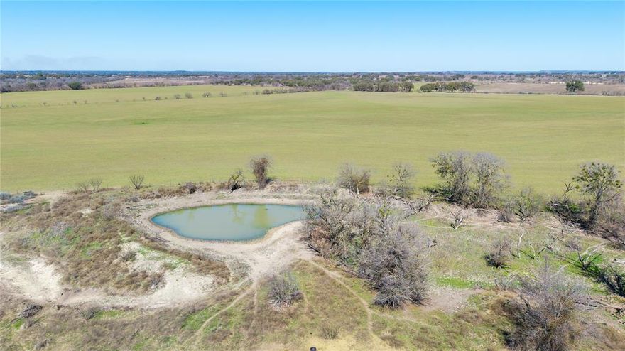 This 453-acre ranch in Mills County offers a blend of beauty and functionality. From the highest point, enjoy beautiful views of the surrounding hills. The property features three stock tanks, a creek, and 164 acres of fertile cultivation, with the remainder consisting of tree-covered land, including mature Live Oaks, Elm trees and native pasture. Perfect for outdoor enthusiasts, it’s an excellent hunting property with abundant wildlife, including deer, hogs, and dove. An old barn adds rustic charm, and the property is fully fenced with all mesquites grubbed, making it ideal for both.