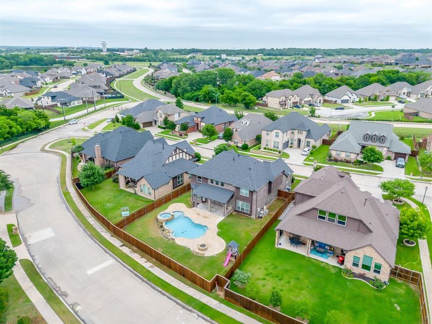 Welcome to this stunning move-in ready 5-bedroom, 4-bath home located in a highly sought-after gated community within acclaimed Burleson ISD! Designed with both luxury and functionality in mind, this spacious open-concept floor plan features a private home office, guest suite with full bath, and an oversized primary retreat conveniently located downstairs.
The impressive living room showcases soaring floor-to-ceiling windows, abundant natural light, and a rock gas fireplace perfect for entertaining or relaxing evenings at home. The chef’s kitchen is a dream with stainless steel appliances, gas range, double ovens, island, breakfast bar, eat-in dining area, and a custom rock accent wall that adds warmth and character.
Follow the elegant curved staircase upstairs to a spacious secondary living area, separate media room, three generously sized bedrooms, and two additional full baths — offering plenty of space for family and guests.
Step outside to your private backyard oasis featuring an extended patio, built-in outdoor kitchen, sparkling in-ground gunite pool, and relaxing spa — ideal for summer gatherings and year-round enjoyment.
Recent updates include a new roof and gutters, fresh interior paint, and brand-new carpet, making this home truly turnkey. Conveniently located near shopping, dining, and major highways, this exceptional property combines luxury living with everyday comfort in one of the area’s most desirable neighborhoods.