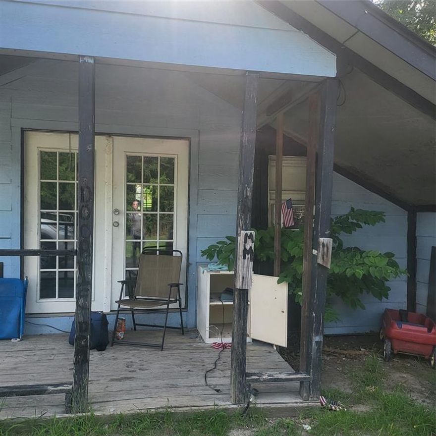 *****INVESTOR SPECIAL***** This property is being sold AS-IS.  Owner will not be making any repairs.  This property needs a lot of work.  The mobile home is the most neglected.  There is a room with a hot tub that does not work off the side of the house.  There is an open area between the mobile and garage called the rock garden.  The garage is large and there is a room upstairs for living quarters.  The garage seems to be in the best shape.  There is also a small shed on the property that has been turned into living quarters as well.  It will need some cleanup and work.  There is also an older storage building on the property that is included.  
The owner is not able to make repairs.  The mobile is in pretty bad shape.  May be able to move it out and replace it.