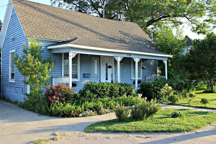 PRIME LOCATION NEAR HISTORIC DOWNTOWN MCKINNEY! Enjoy this beautiful home or office settled in the heart of McKinney, Texas. This 3 bedroom, 2.5 bath home welcomes you with an inviting front porch and adorable blue exterior. Upon entering you'll see hardwood floors, wood stairs, and open living area. This home would make a great home or office near the highly acclaimed Downtown McKinney Square. Currently furnished and used as a short-term rental home. Less than 2 min drive or 10 minute stroll to downtown McKinney's historic square and farmer's market. Exceptional restaurants, shops, and events nearby.