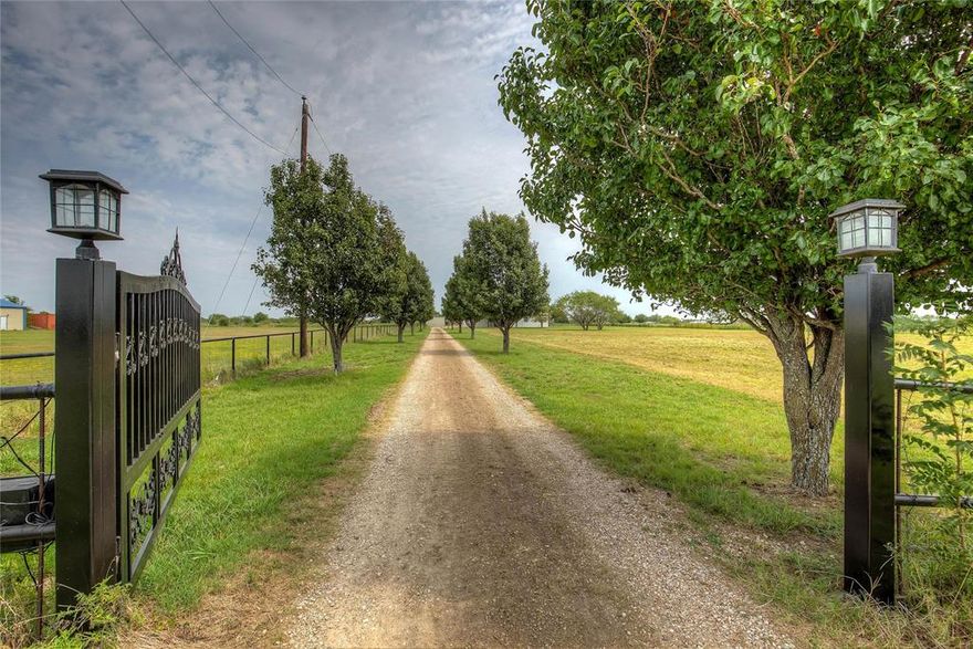 This comfortable home on 5 plus acre is ready and equipped for your family business to operate and flourish.  With high profile road frontage Near I-30 in the growing Caddo Mills without deed restrictions to slow you down.   Home is well off the FM road and with 5 beds and 2.5 baths is roomy and laid out to house a large family or potentially for a multigenerational living situation.  Inside the house has been given a facelift with new paint and carpet to make everything move in ready.  There is a large built in safe or storm shelter ready to protect what matters.  Outside is fully fenced with a pipe fence gate operated with a remote.   Plenty of shop, covered parking and rock parking lot.   Bring your animals- the fencing, barn and pond set up is ready for them!