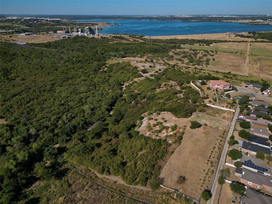 Close to AT&T Stadium with amazing Lake Views!

Discover a rare opportunity to own a prime piece of land in one of Dallas’ most sought-after areas. This vacant lot offers stunning, unobstructed lake views and a direct line of sight to the iconic AT&T Stadium and other developments, creating the perfect backdrop for your future home or investment property. Located in a quiet, established neighborhood with quick access to major highways, shopping, dining, and entertainment, this property offers both serenity and convenience. Whether you’re ready to build your custom dream home or secure land in a rapidly developing area, this lot is a must-see. Endless potential awaits—schedule your visit today.