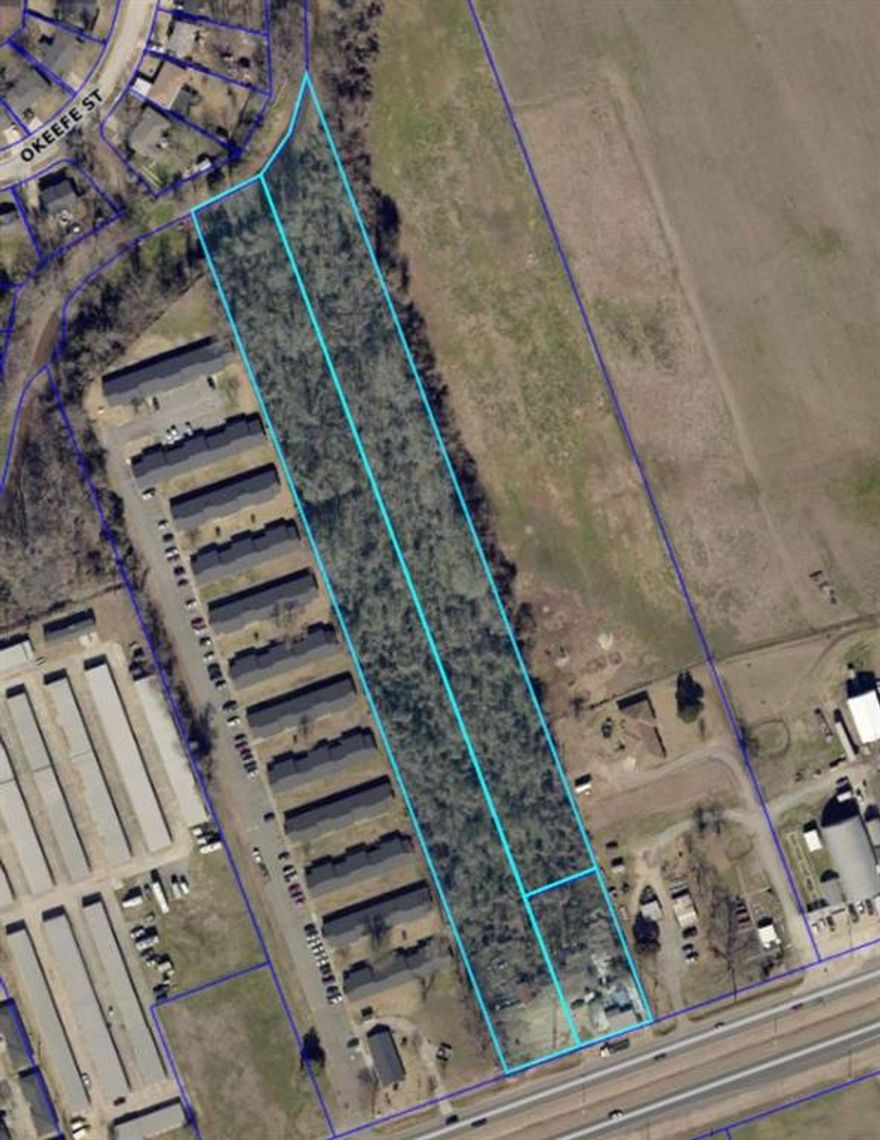 COMMERCIAL LOT FOR SALE IN PRIME LOCATION BOSSIER CITY!!! With 200 feet of road frontage, this property is comprised of 3 lots totaling 5.61 acres! Located in close proximity of Bossier Parish Community College Campus, Cyber Innovation Center, Harrah's Louisiana Downs, Barksdale Air Force Base, and across the street from Villagio, this property is IDEAL for Commercial Business!!! I-20 and I-220 are easy access from the property as well! Two buildings in the front offer no value to the property. Property is being sold AS-IS, no repairs or improvements to be made by seller! Schedule your tour of this AWESOME property TODAY!!!!