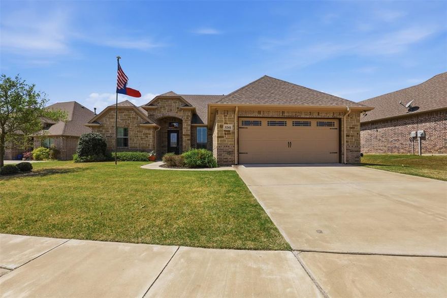 Welcome to luxury living in the highly sought-after Abe’s Landing community in Granbury, Texas. This beautifully crafted home combines quality construction, modern functionality, and timeless design—all nestled inside a gated neighborhood with access to lake amenities.

Built with attention to detail, this spacious home features an open-concept floor plan designed for both everyday living and entertaining. The expansive living area flows seamlessly into a well-appointed kitchen, offering generous counter space, custom cabinetry, and a layout that keeps everyone connected.

The home includes a dedicated office—perfect for working from home or managing daily life with ease—along with three spacious bedrooms and two full bathrooms designed for comfort and privacy.

Tile flooring throughout adds durability and style, while the thoughtful layout maximizes natural light and usable space. Additional features include generator hookup capability, providing peace of mind during any season.

Situated on city utilities and located within a secure gated community, residents of Abe’s Landing enjoy a welcoming neighborhood atmosphere along with convenient access to Lake Granbury, shopping, dining, and top local amenities.

If you’re looking for a home that blends comfort, quality, and location—this one checks the boxes.