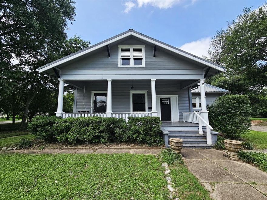 This charming 4 bedroom, 3 bathroom craftsman style home is located in the heart of Groesbeck. Situated on a large tree covered corner lot, with sidewalks and room for a garden.  The home features 2,243 square feet and reflects much of the original charm including wood window shutters, crown molding, large windows which allow lots of natural light into the home, floor to ceiling cabinetry, built-ins and an abundance of storage and. Two of the four bedrooms have private attached bathrooms, and one is oversized with a decorative fireplace.  Fantastic kitchen with gas cooktop, double ovens, dishwasher and lots of cabinetry!  Exterior features include a breezy and inviting 300 sqft covered front porch, covered back porch, large paved driveway parking area, metal roof and more. Property also features a detached garage that could use some work, but would be a great workshop or storage and has an area that could be renovated into a guest space.  Groesbeck is a great place to live and raise a family. It is conveniently located 45 minutes from Waco, Tx and 15 minutes South of Mexia, TX.