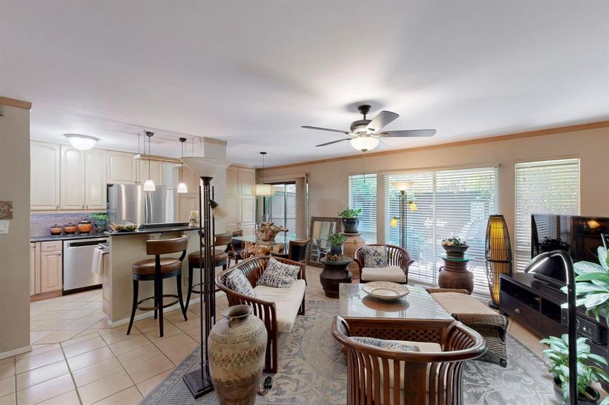 What a great find! Rare and spacious ground floor 1 level condo with tons of storage throughout and not just one, but two large enclosed private patios! What an opportunity to show off your green thumb, while providing ample space for your pets in an otherwise urban setting. Wonderful open floor plan features easy care tile floors and a wall of windows with views to the huge 24 x 8 ft patio from the Living, Dining and Kitchen. Kitchen boasts granite counters, stainless appliances, custom backsplash and pantry. Another wall of storage is found in the adjacent Dining area. A Bonus Room offers  a perfect space for an office, nursery or a door could even be added to create a 2nd bedroom. Fashionistas will enjoy the oversized Master Bedroom, enhanced with a wall of storage cabinets as well as a very large walk in closet and dedicated dressing area! Bath is accessible from both the Bedroom and the hall.  Both the Bonus Room and the Master Bedroom have views to the second patio, 21 x 6 ft which can be accessed from the Bedroom. Parking is so convenient. This unit has 2 assigned side by side parking spaces in the back parking lot, right next to the secure coded access gate to the complex. Once you enter, this unit is the 1st one on the left. All of this, so close to Turtle Creek, Uptown, Downtown and the Katy Trail, with easy access to freeways and the tollroad. Don't miss it!