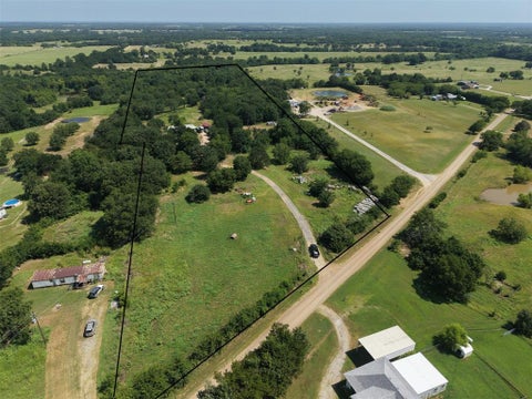Photo of 3700 County Road 4040, Whitewright, TX 75491 (MLS # 21332708)