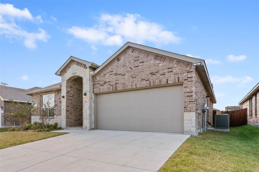 You've been searching.....and you've found it. Discover this gorgeous, newly built, single-story, 4-bedroom home in the master-planned Trails of Elizabeth Creek community, located in the esteemed Northwest Independent School District. Its open-concept design seamlessly connects the large chef’s kitchen, featuring a spacious island, quartz countertops, pendant lights, stainless steel appliances, a gas range, and a walk-in pantry, to both the dining area and a bright living space at the rear. The primary suite offers a luxurious retreat with a dual-sink quartz vanity, an oversized shower, and a spacious walk-in closet. Additional highlights include quartz-topped vanities in both bathrooms, an oversized laundry room, and a 6-foot fenced backyard—perfect for your pet. Enjoy outdoor living with a covered patio and full landscaping with a sprinkler system. The home also includes smart-home technology, an energy-efficient HVAC system, and a gas tankless water heater. Community amenities abound, with a pool, cabana, playground, tot lot, and lazy river, all conveniently near I-35W, HWY 114, top-rated schools, shopping, dining, and the Texas Motor Speedway—this is THE ONE!