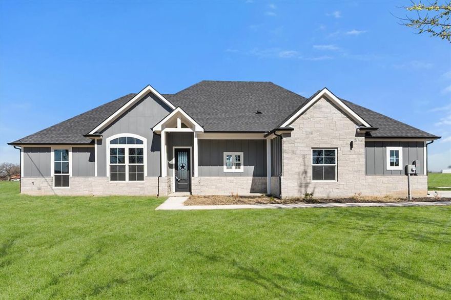 Discover refined country living in this beautiful new construction home located in sought after Grandview ISD in Grandview, Texas with NO HOA. Situated on a spacious 1.77 acre lot, this 4 bedroom, 3 bath house offers the perfect blend of luxury, comfort, and room to roam. Step inside to an open concept design featuring high end finishes throughout. The gourmet kitchen includes stainless steel appliances and an oversized island, ideal for both entertaining and everyday living. The private primary suite provides a relaxing retreat with a spa inspired ensuite bath, complete with a soaking tub, walk-in shower, dual sinks and a spacious walk-in closet. Three additional bedrooms are thoughtfully positioned on the opposite side of the home, including one with a private ensuite bath. This well designed split floor plan offers exceptional privacy and flexibility for family, guests, or a home office. Enjoy peaceful Texas sunsets from your covered patio while taking in the wide open space and endless possibilities that almost 2 acres provides. You have plenty of room for a shop, pool, or outdoor oasis.
Experience the charm of small town living with convenient access to nearby amenities, all within the highly regarded Grandview ISD. This exceptional property delivers modern luxury with the tranquility of country living. Schedule your private showing today!