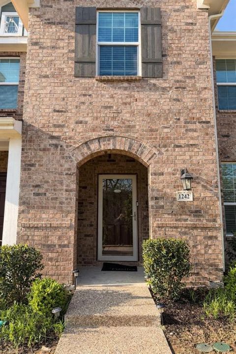 Photo of 1242 Alamo Drive, Lewisville, TX 75077 (MLS # 21219310)