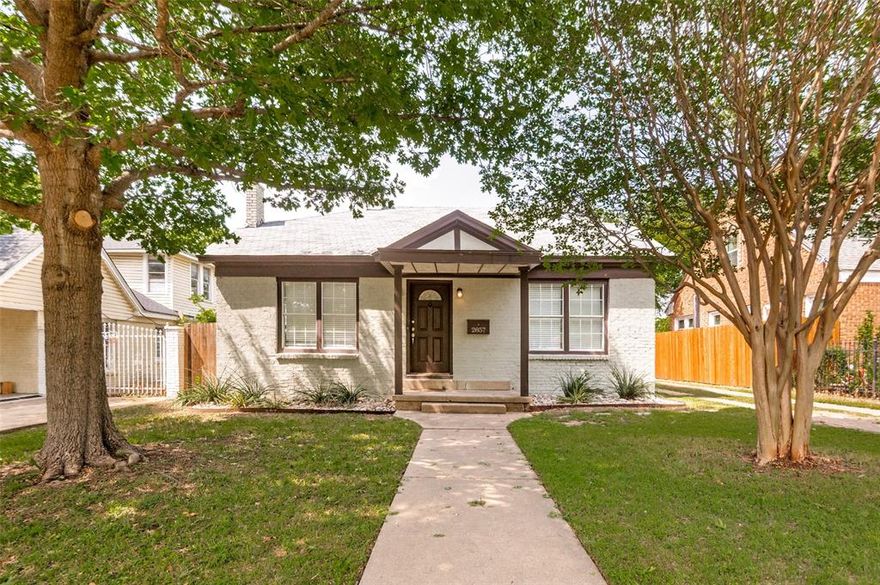 Charming two bedroom (plus bonus room) home in the heart of Oak Cliff! On a quiet street with mature trees and sidewalks, while only 4 minutes to Tom Thumb! 2857 W 12th st. offers defined rooms with a seamless flow, original hardwood floors, as well as many built in shelves and cabinets, creating that warm character we love. Newly renovated with new kitchen cabinets, granite counters, and a fresh coat of paint. New roof as of 2022. New HVAC as of 2023. HUGE, fenced backyard! The primary bedroom has a large walk-in closet. The dining room features built in cabinets and modern lighting to host the perfect game night! A recently added bonus room is perfect for a home office, additional storage space, game room, etc. The extended driveway offers ample parking. The location is fantastic! 4 mins to Tom Thumb, 6 mins to Wayward Coffee Co, 8 mins to the fun TyPo neighborhood, and 9 mins to the Bishop Arts District.