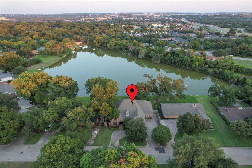 Huge Price Improvement! Private Lakefront Living in Ridglea Hills.
Homes like this rarely come on the market. Located on private Bal Lake in the heart of Ridglea Hills, this 4-bedroom, 3½-bath single story, brick home offers a lifestyle that’s both peaceful and connected—just minutes from shops, dining, and downtown Fort Worth.With 3,155 sq. ft. under roof, the home is filled with soaring 12-foot ceilings, natural light, and open spaces designed for comfort and entertaining. Hardwood and travertine floors bring timeless style, while custom finishes—including antique mantles and designer lighting—add character you won’t find elsewhere. The thoughtful layout features generous bedrooms, a private study, and an oversized 2-car garage. A fireplace anchors the living room, creating a warm gathering spot, while expansive windows frame tranquil lake views that set this home apart. Step outside and the magic truly begins. Enjoy coffee at sunrise, unwind at sunset, or host friends by the water—all from your own backyard. It’s a rare combination of privacy, convenience, and natural beauty in one of Fort Worth’s most established neighborhoods. Private Waterfront. Central. One-of-a-kind. This is Fort Worth living at its finest.