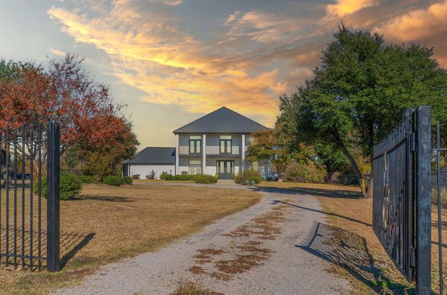 LOCATION, ACREAGE, UPDATES, and a POOL! UPDATED HOME on a 1.21-ACRE beautiful, FULLY FENCED lot 1 MILE from HWY 75 in desirable Howe with a POOL! Looking to escape the congestion of suburbs under constant development? This unique property is not your cookie cutter home, but instead an entertainer's dream displaying extensive recent upgrades inside and out. Enjoy resort-style living with the sparkling saltwater pool (new pump, filter, salt cell, and equipment roof and housing in 2023) complete with a gas heater for year-round enjoyment. The exterior is an absolute showstopper highlighted by a massive 1,288 sq ft of covered patio space across the upper and lower decks offering incredibly stunning sunset views from both the upper and lower balcony and patio. Entertain rain or shine on the lower covered patio effortlessly controlled by five new motorized patio screens (2025). The property features a new roof (2023), and is enclosed by a full-property 6-foot iron fence with two electric entry gates for privacy and security. Interior updates boast a fully remodeled kitchen and primary bath, a new whole-house water filtration system, new fixtures and lighting throughout, updated real wood stairs, and newly stained concrete floors downstairs for easy maintenance; the third bedroom even has heated flooring! The property also includes an outdoor wood storage shed with a metal roof (built 2022) and a new irrigation system. For the electric vehicle owner, EV wiring is already in place! The hot tub and a John Deere zero-turn mower can convey with the property with an acceptable offer. Don't miss this opportunity to own a truly unique, turn-key estate that is the perfect blend of peaceful country living with the convenience of easy highway access, and say hello to clear, star-filled nights!