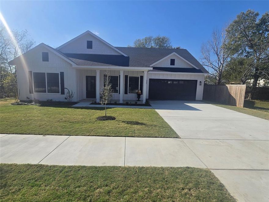 Welcome to this spacious modern styled Craftsman home completed Dec 2025 this 4-bedroom, 2-bath 2 Car garage home located on quiet mature street of Waxahachie with no traffic! The home has laminate and carpet throughout, and comfort-sized bedrooms provide plenty of space for everyone. The bright white kitchen boasts quartz countertops and a large sit spaced island, custom wood cabinetry, stainless steel appliances, and a walk-in pantry. The living room is separate yet connected, this open floor plan is ideal for gatherings. Separate laundry rm and huge 2-Car garage with plenty of light. Whether you choose the large, covered front or back porch, both are excellent for relaxing evenings. The city is currently completing Street & Drainage Project, enhancing this area to excellence! This is a must see…