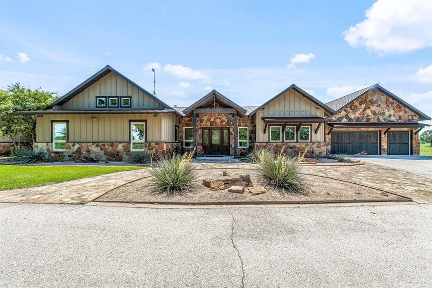 Exceptional Equestrian Estate on 77 Acres – Stunning Home, Guest Quarters, and Premier Facilities!
Experience refined country living in this beautifully crafted residence, showcasing high-end features such as hardwood flooring, quartz and granite countertops, a spacious open-layout kitchen, a large living area, private bedroom wings, dedicated office, mudroom, and expansive shaded patios for outdoor enjoyment. The property includes multiple auxiliary structures, approximately four stock ponds, and an oversized barn-workshop equipped with six horse stalls, a tack room, wash bay, and large roll-up doors. Truly a property you need to see to believe!