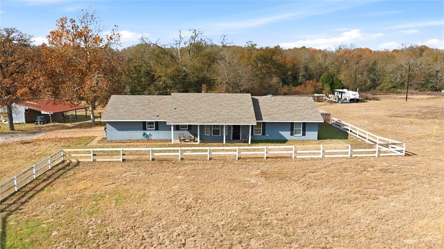 FANTASTIC COUNTRY RETREAT!! Bring the family, horses or even the cows if you want to have a small ranch. This home is located on 13.48 acres, pond, approx half is wooded and half pasture. Perfect for the horses and to make trails in the woods for entertainment or enjoy the wooded beauty. Pond is located about half way back on the property. This ranch style home offers 3 sizable bedrooms, 2 updated full bathrooms, and large living area. Tasteful updates throughout the home including granite countertops, wood engineered flooring, fresh paint inside and out, modern fixtures and lighting. Designer colors and decor and updated bathrooms. This one is move in ready. Outside you are greeted with a large covered porch with views over the beautiful landscape. Includes an above ground pool with a large deck for those hot summer days. Just before the woods start, there is an RV hookup with its own electric and water. The septic ties into the main house. From the front of the home, beautiful scenic rolling pasture, slightly lower than the road that buffers any traffic noise. Don't let the highway address deter you, on this property, you do not even realize it is there. This property can be sold with an existing large doublewide that is presently located on the property or it can be removed. It is considered personal property and not permanently attached to the ground. Would make great guest quarters or used for rental income. Listed also including the DW for a price of $580,000. Ask LA for details. Make plans to come see this litle slice of country heaven with the best of all worlds.