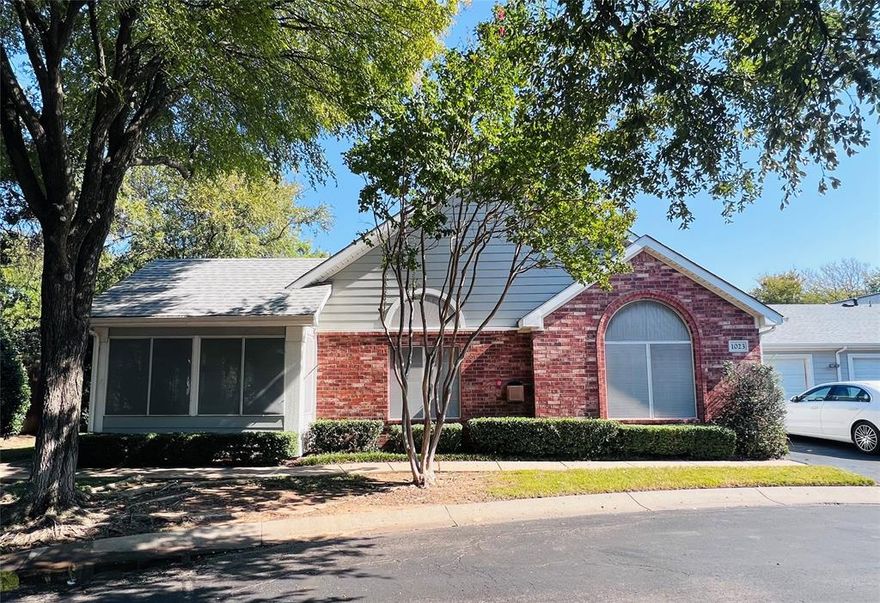 Rare 3-2-2 Condo in GATED PRIVATE CONDO VILLAGE in convenient Arlington Location.
Welcome to this beautiful open floor plan condo with lots of natural light that truly feels like a single-family home and has been lovingly cared for by the same owner for 22 years. Step inside to soaring vaulted ceilings, a cozy gas fireplace, and an oversized heated and cooled SUNROOM—perfect for enjoying comfort year-round.
The secondary bedroom offers a BUILT-IN MURPHY BED with bookshelves, making it ideal for guests or a flexible home office. The laundry room features custom cabinetry for easy organization, while the garage provides abundant BUILT-IN STORAGE.

Enjoy a carefree lifestyle with the HOA covering exterior maintenance, basic cable, and water. The gated community offers wonderful amenities including a sparkling pool, clubhouse with fitness center and game room, scenic walking trails, and a peaceful pond with a fountain.

Perfectly located in the heart of Arlington, you’ll be just minutes from the Ballpark, the Stadium, shopping, and dining. This is low-maintenance living at its finest—come see it today and fall in love!