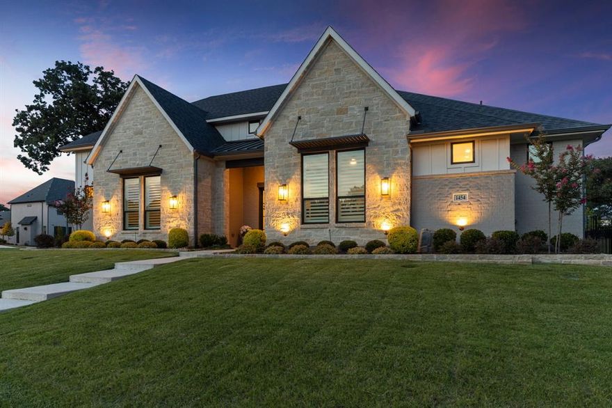 Welcome to your dream home in the exclusive gated community of Sunset Point at Twin Cove, perfectly nestled along the shores of Lake Grapevine. Built in 2023 by Bud Bartley Custom Homes, this exquisite 4-bedroom, 4.5-bathroom residence spans 5028 square feet and effortlessly blends refined elegance with modern comfort.

From the moment you step inside, you are greeted by custom finishes and thoughtfully designed spaces throughout. The heart of the home is a chefs dream kitchen; complete with sleek quartz countertops, a generous oversized island, built-in refrigerator, separate ice maker, and an expansive walk-in pantry. The open-concept layout flows seamlessly into a light-filled living area anchored by a striking fireplace and floor-to-ceiling sliding glass doors that fully retract, extending your living space to the outdoors. Designed for effortless entertaining, the home features a downstairs media room with a projector, wet bar, and wine fridge, as well as an upstairs game room with a built-in desk area, ideal for work or play. Step outside to your own private oasis: a sparkling pool and spa with soothing water features, a covered and screened patio, and a fully equipped outdoor kitchen; all designed for year-round enjoyment under the Texas sky. Beyond your backyard, you are just a short walk from the scenic biking and hiking trails, Twin Coves Marina, and Lake Grapevine, making this home a haven for nature lovers and outdoor enthusiasts alike. This exceptional property is more than a home, it is a lifestyle. Come experience Texas luxury living at its finest!