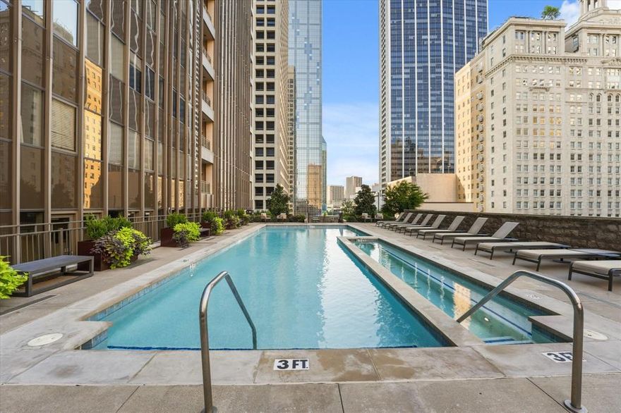 Step into a world of sophistication and modern elegance with this exquisite 1-bedroom, 1-bathroom high-rise condo, perfectly situated on the 15th floor in the heart of Downtown Dallas. Designed for those who appreciate the finer things in life, this residence offers an urban lifestyle surrounded by breathtaking vistas and a vibrant vertical neighborhood. The moment you enter, you're greeted by a lofty open floor plan adorned with custom lighting and rich hardwood flooring throughout. The gourmet kitchen is a culinary enthusiast's dream, featuring sleek stainless-steel appliances, gleaming granite countertops, a stylish breakfast bar, and a striking herringbone marble backsplash. Retreat to the serene master suite, where luxury meets comfort. The master bath is designed with exquisite travertine tiles, offering a spa-like experience right at home. Residents of this prestigious building enjoy a host of exceptional amenities, including newly renovated common areas, a 24-hour concierge service, and an array of lifestyle facilities. Take a dip in the rooftop pool, entertain in the theater room, or savor al fresco meals in the grilling area. Stay fit and productive with access to the fully-equipped fitness and business centers. Experience the pinnacle of modern urban living in this stunning Dallas condo, where every detail is crafted for luxury and convenience. Don't miss this opportunity to live luxuriously with expansive views and an unmatched lifestyle.