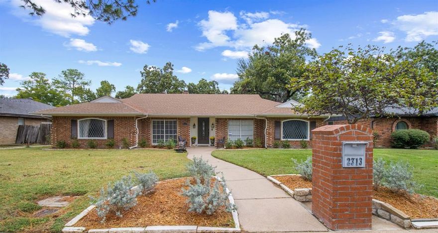 Welcome Home to 2313 Perryland Drive!

Located in one of Arlington’s most highly desired neighborhoods, this traditional home offers a perfect blend of warmth, space, & everyday functionality, all within walking distance to both the elementary & junior high schools.

You’ll feel the inviting openness of this extremely spacious floor plan, thoughtfully designed with three separate living areas that flow seamlessly together. The sunroom, is surrounded by windows & currently serves as a pool table & game room, filling the home with an abundance of natural light.

The kitchen is generously sized, featuring custom cabinetry, quartz countertops, ample storage, & plenty of counter space. The cozy eat in nook comfortably fits a bistro table & offers the potential to add a charming baking or pastry island with stools, making it perfect for anyone who loves to cook & entertain.

A formal dining room is ideal for gatherings or dinner parties, while the main living area provides a cozy retreat with a fireplace flanked by custom built ins. The wall above the mantel is wired for your television, offering the perfect entertainment setup.

With four bedrooms, or three plus a home office, 2.5 baths featuring granite countertops, & a large laundry room with excellent storage, this home is designed for both comfort & practicality. You’ll find tile & wood look plank flooring throughout.

Outside, the backyard offers impressive versatility: a 45’ concrete pad complete with an electrical box, perfect for RV or boat parking, a motorcoach, or an outdoor living space. Privacy & security are ensured by the 8’ electric board on board gate, 6’ fencing on all sides, & gates on both sides of the home.

Additional highlights include a sprinkler system, full gutters, & beautiful leaded glass front windows that add character.

With its flexible layout, bright interior, & unbeatable location, this home is a Must See.  Schedule your showing today. It’s better in person!