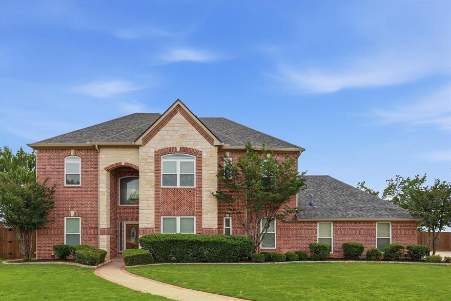 Amazing home in Keller ISD with pool on oversized lot!  Beautifully updated inside with wood floors, neutral decor, and very open layout!  Very light and bright with high ceilings!  Large eat-in-kitchen with quartz countertops, stainless steel appliances, large island and plenty of room to cook and entertain!  Spacious living room with cozy fireplace, overlooking your amazing backyard oasis!  Room for large family and large furniture!  Formal dining room or use as flex space.  Relax and unwind in the primary bedroom with French doors that open to the pool!  Huge closet and spa-like retreat!  Dual sinks with quartz countertops, shower and tub!  Great storage and good sized laundry room!  Remodeled baths! Upstairs enjoy a HUGE game room, 5 more fantastic bedrooms and 2 full baths!  Use 6th bedroom as flex space, home gym, or office! So much room and so many possibilities!  Step into your dream backyard oasis!  A sparkling oversized Claffey pool with hot tub and travertine decking!  Outdoor kitchen to BBQ for your friends and family!  Wonderful outdoor covered patio too!  The yard is one of the largest around at just under a half acre!  3 car garage!  Close to the schools, entertainment, HEB, shopping, Alliance Town Center, and Highway 35!  Run to see this impeccably maintained home! Newer: roof, gutters hvac, tankless water heater, fence, driveway, and more!