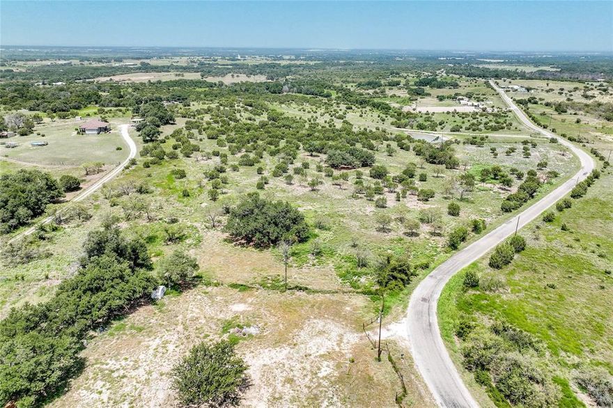 Discover the ideal setting to build your dream home on this scenic 2-acre tract located within Lipan ISD. This versatile property allows for site-built homes, manufactured homes, and barndominiums, offering flexibility for a variety of lifestyles. Enjoy peaceful country living with wide-open views and a quiet rural atmosphere, while remaining just 20 minutes from I-20 for an easy commute. Conveniently located near Weatherford and Granbury for shopping, dining, and entertainment. Electric available. Will require well for water. Owner financing available.