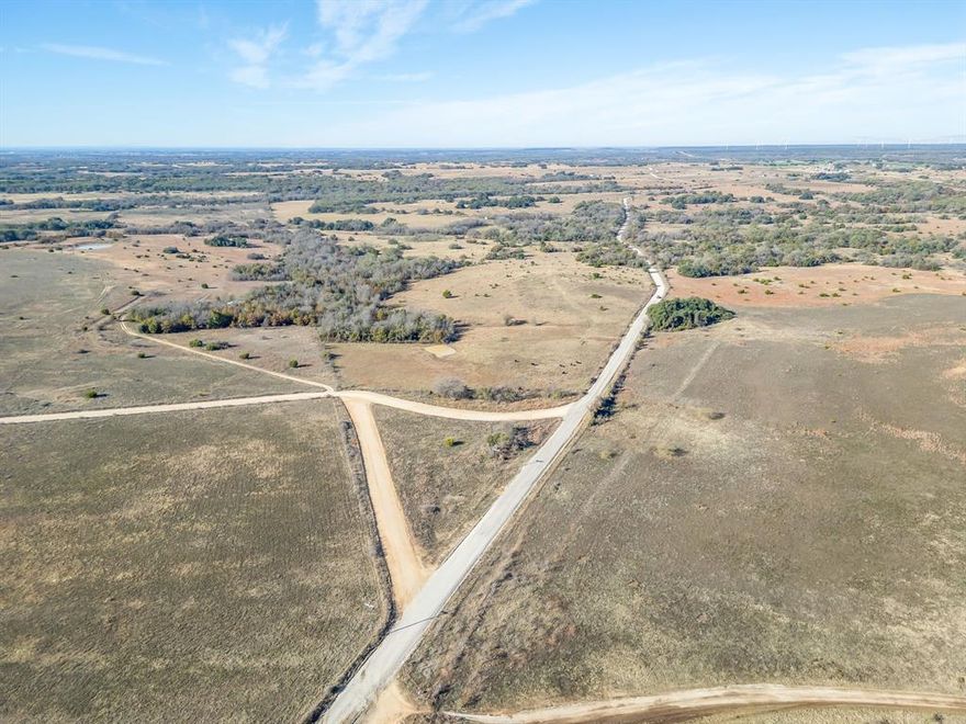Located just 70 miles from Downtown Fort Worth and only 10 miles northwest of Stephenville in the heart of western Erath County, this exceptional ranch offers a balanced blend of productive grazing land, diverse wildlife habitat, and beautiful Texas scenery. With approximately 380 feet of frontage on all-weather County Road 403 and an impressive 4,600 feet along County Road 406, the property provides outstanding access with multiple gated entry points.

The ranch is fully fenced with 5 and 6-strand barbed wire fencing and is thoughtfully divided into two primary grazing pastures. Cattlemen will appreciate the well-built, functional working pens, improved pasture planted in Klein grass, two stock ponds and a seasonal creek traversing the ranch. In addition to excellent fencing the other key improvements include electricity available in multiple locations, as well as a three plus acre soft turnout paddock from the working pens offering ease of various cattle management options. A water well with a TPD of 120’ is centrally located producing 20 gpm providing a sustainable water supply to livestock and wildlife alike.

The land itself is beautifully balanced, offering open pastures and areas of quality hardwoods and native brush that create ideal cover for the abundant wildlife including whitetail deer, turkey, dove, ducks, and the occasional feral hog. With roughly 50 feet of elevation change, the ranch delivers sweeping views and multiple building site options.  Hardwoods include post oak, blackjack oak, live oak, cedar elm, mesquite and limited juniper and cacti can be found.  Native grasses abound on this property and evidence of decades of good land stewardship is obvious. 

Rectangular in shape, well-improved, and rich in natural character, this ranch stands out as a premier opportunity for both recreational enjoyment and productive cattle use. Bring your livestock, your family, or your weekend gear, this is classic Erath County ranchland at its finest.