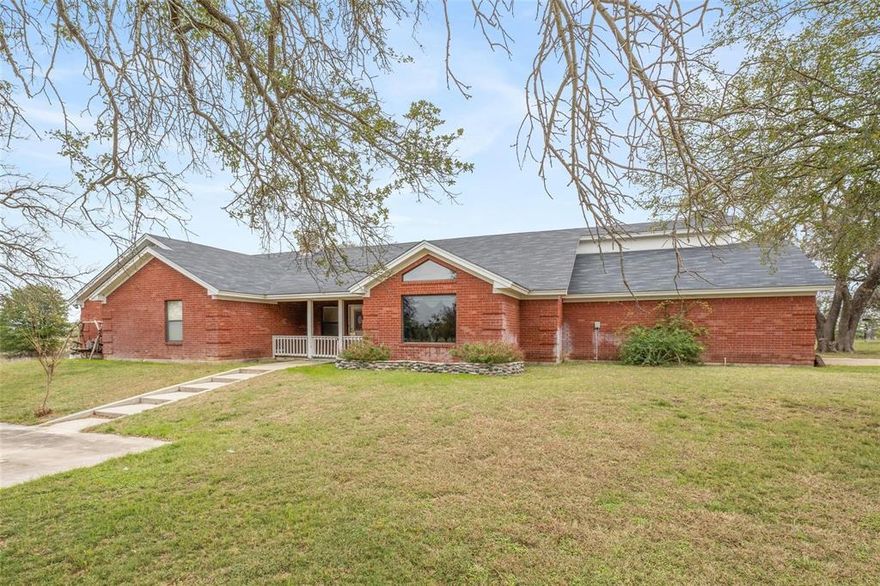 This Beautiful Custom Built 3754 sg ft home has 4 bedrooms and 3.5 bathrooms on 8.72 acres.. As you enter through private gate and drive down the tree lined lane you will experience a park like atmosphere. There is a barn with holding pens, and a workshop with electricity. When you enter this home you will be amazed at the artistic custom river rock floor to ceiling woodburning fireplace. Cathedral ceilings add to the majestic living room that also has a built in bar. The kitchen was set up for family and friends with double oven and seating for them all with breakfast nook and a private connecting dining room. The primary bedroom is oversized with an ensuite that has separate vanities, his and her walk in closets and large walk in shower. An oversized utility room off the primary bathroom. You have access to a screened in porch with half bath that leads to the gorgeous heated inground pool. A custom wrought iron gate surrounds this beautiful pool area that is perfect for entertaining. There is a private office and lots storage. This beautiful home has so much more!! A great family home! Do not miss a chance to own this Beautiful home.