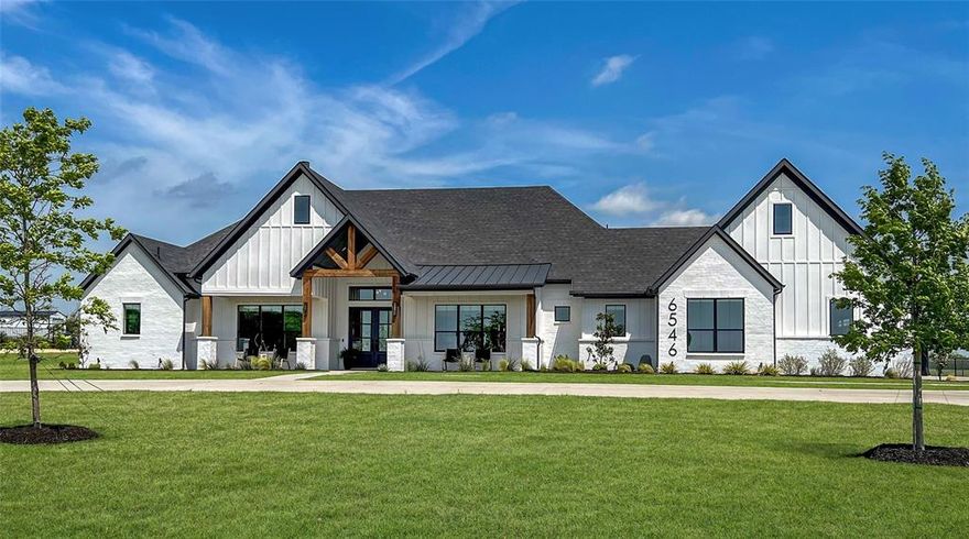 Experience refined country living in this modern farmhouse estate, thoughtfully situated on a spacious 2-acre lot without HOA restrictions. This property affords extensive flexibility, allowing for additions such as a workshop, a pool with cabana, or convenient parking for an RV or boat. The single-story custom residence comprises four generously sized bedrooms, each appointed with its own ensuite bath and walk-in closet, complemented by a dedicated office located near the entry. The primary suite features a sophisticated bath with dual vanities, a double walk-in shower, garden tub, and custom-built closet system.

Designed for both everyday living and entertaining, the kitchen showcases dual islands, a commercial-grade gas range, double convection ovens, built-in refrigerator-freezer, pot filler, microwave, and an expansive walk-in pantry. The family room is enhanced by a cathedral ceiling with exposed beams, a wood-burning fireplace, and a wall of windows providing natural light and a view of the covered back patio.

Outdoor amenities include a second fireplace, outdoor kitchen, and ample seating within the covered patio area. Adjacent to this space is a sizable game room, equipped with two built-in wine coolers, a wet bar, and substantial storage options. Functional utility spaces include a laundry room with abundant cabinetry, counter space, drip-dry area, freezer accommodations, and full-sized washer-dryer hookups. The three-car swing garage is finished with epoxy flooring and offers a fully floored attic for exceptional storage capacity.

Further highlights include a built-in basketball goal, ceiling fans in all bedrooms, quartz countertops throughout, energy-efficient upgrades such as a radiant barrier attic, tankless water heaters and additional premium features. Constructed in 2023 and located within the esteemed Celina Independent School District, this distinguished property seamlessly integrates contemporary luxury with the serenity of rural living.