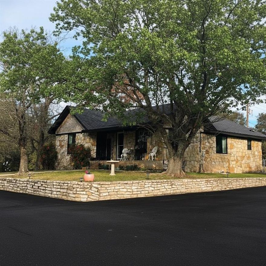 Beautifully updated Craftsman historical home on 2.38 scenic acres. Sits on a hill overlooking north side of Weatherford. Enjoy the bluebonnets and wildflowers in the spring and stunning sunsets and views of downtown Weatherford in peace and quiet all year round. Totally renovated 3 years ago with new energy efficient Pella windows, doors. New paint, flooring, kitchen appliances, central heat and air, new fixtures in both bathrooms. 1 workshop or storage building 18x21x8 with concrete floor and asphalt roof and 1 workshop or storage building 23x26x10 with concrete floor and metal roof and  24x24 covered carport with concrete floor and metal roof on property for handyman or hobbies or 1 or 2 horses. Fenced in yard for pets.  People come from all around to take pictures in the river of bluebonnets every Spring. Priced to sell fast.