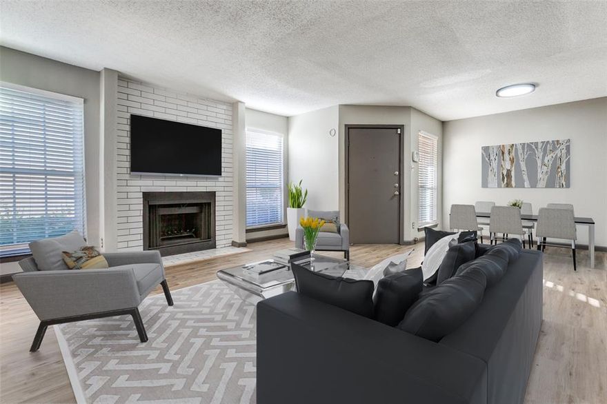 UUpdated condo featuring a large covered patio with a pool view. This modern one-bedroom, one-bath condo is located on the first floor. The kitchen comes equipped with all the necessary appliances and overlooks the dining and living areas. Imagine spending evenings by the fireplace, which has been updated with contemporary tile. The bathroom is designed with stylish white tile and offers ensuite access. The bedroom includes a spacious walk-in closet with plenty of hanging space and shelving. Additionally, the condo is equipped with electric central air and heat, LED lighting, and a utility room that can accommodate a full-sized washer and dryer, along with extra pantry shelving. Conveniently located near Highways 635 and 75, this property allows for easy access to viewings. It is situated in the highly desirable Creekbend Condo development, close to Richland College, Texas Instruments, and International Battery—making this an opportunity not to be missed! Enjoy a cup of coffee, tea, or a glass of wine while you watch the world go by. Assigned covered parking is available nearby, and community mailboxes are conveniently located at the end of the building. Come see it for yourself.