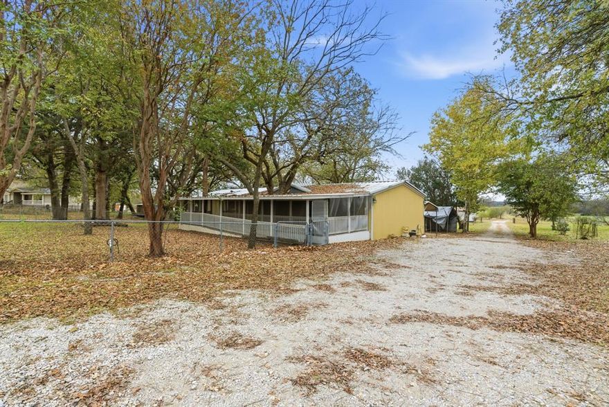 Live the ultimate Texas country lifestyle with peace of mind on this Parker County farm! Situated on over 6 acres, this property combines rural privacy,  and recreational fun. You are perfectly positioned just minutes from the boating and hiking at Eagle Mountain Lake, yet an easy commute to the dining, shopping, and employment centers of Fort Worth.

Bring your horses and fishing poles—this property is a true outdoor paradise. While close to the big lake, you have your own extremely large private pond right in the backyard, offering excellent fishing and serene water views. Fully equipped as a horse property, the grounds feature existing stables and plenty of room for grazing, making it ideal for an equestrian estate, hobby farm, or 4-H projects.

The 2,026 sq. ft. residence has 4 spacious bedrooms and 2 full baths. The home has been thoughtfully updated, featuring a custom built-in coffee bar and a unique, spa-like master bath. A major recent addition is the BRAND NEW STORM SHELTER, providing invaluable safety and security for your family during Texas weather seasons.

Outdoor living takes center stage here. The home is wrapped in massive covered porches, perfect for entertaining or quiet mornings. The grand 43’ x 18’ front porch offers undeniable curb appeal, while the 18’ x 15’ back porch is the perfect vantage point to watch sunsets over your pond.

From the private fishing pond and space for horse or livestock facilities to the added security of a new storm shelter, this listing offers endless possibilities. Versatile acreage with storage, a private extra large pond and so much more close to the DFW metroplex. Buyer to verify all information.
Disclaimer:
All property information is deemed reliable but not guaranteed. Buyers, tenants, and their representatives should independently verify all details, including but not limited to measurements, permitted uses, zoning, schools, utilities, and any other information important to their decision-making.