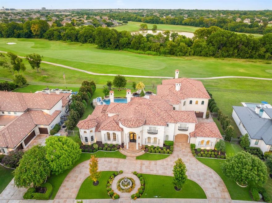 Set within the prestigious gated enclave of Wimberley Place, this Mediterranean masterpiece by renowned builder Steve Robert commands attention with sweeping golf course views and timeless architectural elegance. Encompassing over 9,628 square feet of meticulously curated living space, the residence showcases exquisite craftsmanship and luxurious finishes throughout.

Designed for both comfort and versatility, the home offers five expansive bedrooms, five full baths, and one-half bath, including two master suites, one on the main level and another upstairs—making it perfect for in-laws or guest accommodations. The main-level primary suite is a private retreat, highlighted by heated marble bathroom floors and a steam sauna shower.

A Control4 smart home system ensures effortless control of lighting, audio, and video throughout, while the gourmet kitchen is a chef’s dream, complete with top-tier appliances and custom design cabinetry. Outdoors, tranquility reigns with a serene Japanese koi pond and a resort-style negative edge pool perfect for both relaxation and entertaining.

This is a rare opportunity to own a residence that defines luxury in one of the area's most coveted communities.