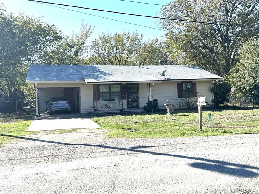 Very cute small-town home! This little 1284 square foot property has 2 large bedrooms, 2 very nice size bathrooms in which primary has a large walk-in closet, a 15 x 19 living area with large windows, and a great size dining room kitchen with built in wood cabinets and pantry and separate laundry area. It has a terrific 5 x 16 covered patio in front to enjoy that morning coffee and watch the kids walk to school and a 10 x 20 covered patio in back for those family events. This property offers a 10 x 25 workshop that with some work could be a terrific in-law suite or she shed. Don't miss the opportunity to make this yours!

Buyer and buyer's agent will need to verify all information including but not limited to measurements. All information deemed reliable but not guaranteed.