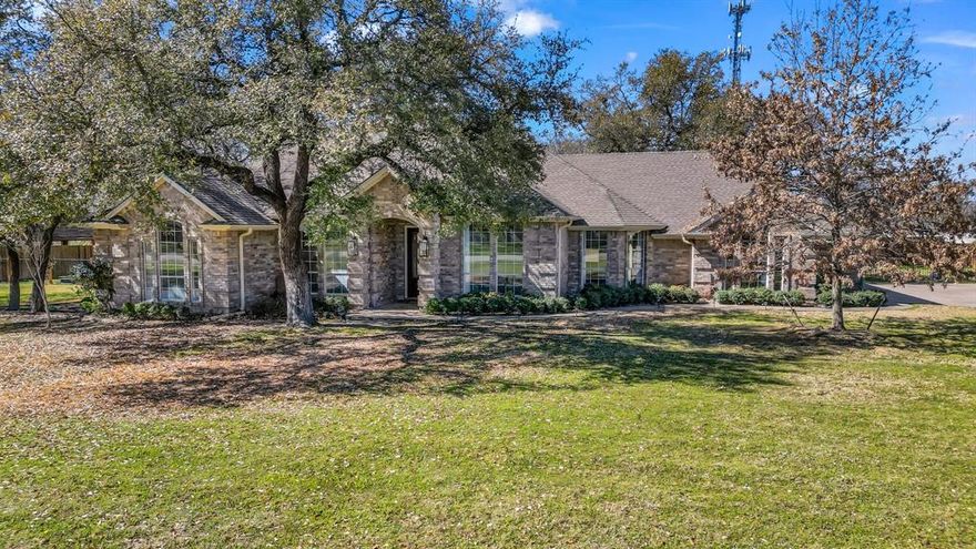 Nestled in the peaceful McDavid Estates where homes are rarely available, this one-story 4 bedroom 3 bath home sits on a spacious one-acre lot. Featuring an expansive primary suite with dual vanities, a separate shower, and a large walk-in closet, this home offers both comfort and style. The three generously sized secondary bedrooms share a Hollywood bath, perfect for family or guests. The home boasts two separate living areas,  along with a spacious kitchen featuring two breakfast bars, ideal for a growing family, and entertaining. A dedicated utility room with an attached full bath provides easy backyard access. A families job transfer is your perfect opportunity to own a home within the coveted Aledo School District! With easy access to I20 you are minutes from shopping, entertainment and restaurants of Weatherford, Hudson Oaks, Willow Park, Aledo and a short drive to Downtown Ft Worth, don’t miss this incredible opportunity!