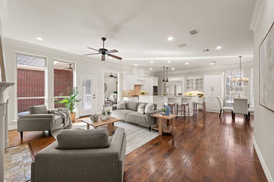 SEARCH YOUTUBE FOR A VIDEO OF THIS HOME! OPEN HOUSE JAN. 31 1-3PM, & FEB 1, 11-1PM! Welcome to 2709 Mesquite in Western Oaks-the heart of Grapevine! This is an exceptional home that blends high-end updates, thoughtful design, & an unbeatable location! Situated on a large, heavily treed interior lot within the neighborhood. Step inside and find the island kitchen is an absolute showstopper, designed for serious cooking & entertaining! It features a new 48in BUILT-IN stainless refrigerator (2025), a 36-inch PRO-STYLE six-burner range top, DOUBLE 30in convection ovens, a warming drawer, a wine chiller, & a CUSTOM stainless single-basin farmhouse sink! Under & over cabinet lighting highlights the space beautifully, while the huge breakfast bar makes it the natural gathering spot for family and friends. Rich hand-scraped hickory wood flooring & classic plantation shutters elevate the home’s timeless style. The spacious floor plan offers generous bedrooms, all but one have large walk-in closets, & all of the secondary bathrooms have been updated! All new carpet and interior paint throughout the ENTIRE home in 2026 make everything feel fresh & move-in ready! Car enthusiasts will love the 3-car garage with epoxy floors (2025) and 11'+ ceilings, allowing the potential for car lifts thus additional vehicle storage! A gated motor court adds privacy & curb appeal. Step outside to your private backyard oasis featuring a resort-style LED lit pool featuring a hot tub, waterfalls, copper fire-and-water bowls, and Trex composite decking... perfect for relaxing evenings or entertaining year-round! The LOCATION truly seals the deal! Parr Park & miles of Grapevine’s 10-foot-wide concrete trail system are just a short distance away, offering endless outdoor recreation! Also, arrive to DFW Airport in just 10 minutes, while NOT being in the daily flight path! This home offers luxury, comfort, and convenience in one of Grapevine’s most desirable settings. Don’t miss it!