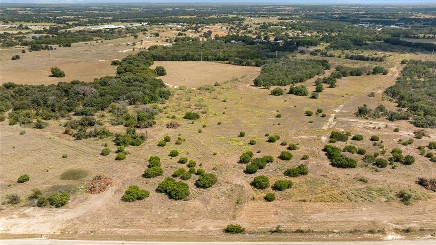 Tract 5 is 2.379 acres. Power is being brought along County Road for future access as an included feature. All Lots are 2-3 acres Tracts. Great Location on Paved Road outside City Limits. This is a great opportunity to Build your perfect Dream Home in a great area just outside of town. Additional Lot MLS 21060332, 21060626, 21060753, 21060726, 21060730, 2106043, 21060446,21060764, 21060786 Buyer will be required to get a new Survey