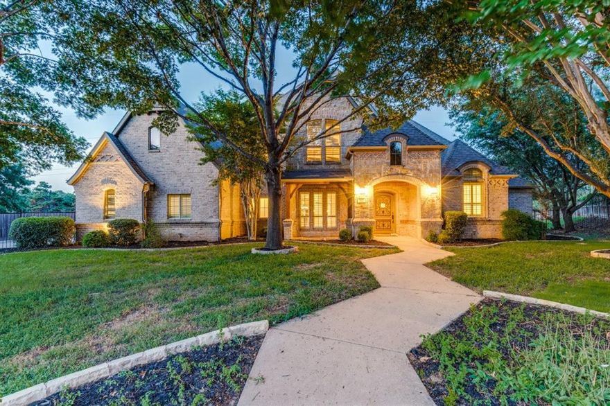 Exceptional 5 Bed, 5 Bath Luxury Home on 0.51 Acres in Award-Winning Carroll ISD

Built in 2002 during a pinnacle era of superior construction quality, this fully upgraded and freshly painted 5-bedroom, 5-bath estate offers timeless elegance and modern luxury in Southlake, conveniently located near Westlake. The home features engineered hardwood floors and extra-large porcelain slabs that add a sleek, sophisticated look throughout. Plantation shutters adorn many windows, while a grand staircase with integrated LED lighting creates a stunning focal point.

The chef’s kitchen is a true centerpiece, equipped with premium appliances, updated cabinet hardware, a cozy breakfast nook, and a stylish wine bar perfect for entertaining. The spacious primary suite is a peaceful retreat, complete with his-and-her walk-in closets, a comfortable seating area ideal for reading or quiet reflection, and a spa-inspired bath featuring marble floors, a freestanding soaking tub, a frameless glass rain shower with LED lighting to create a calming ambiance.

Additional highlights include a dedicated media room, a 4-car garage, a metal swing door adding privacy and industrial-chic appeal, modern chandeliers, and LED surround lighting in the living area. Step outside to an expansive landscaped backyard featuring a beautiful row of mature magnolia trees and a fully fenced dog run area, perfect for pets.

Enjoy the convenience of a community pool located right next door, ideal for relaxation and recreation during warmer months.

Conveniently located near Highway 114 and Southlake Town Square, this home offers easy access to premier dining, upscale shopping, and is zoned for the highly sought-after Carroll Independent School District