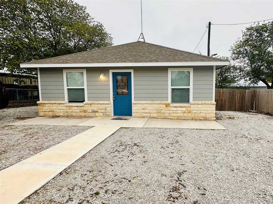 1 bedroom, 1 bathroom in a quiet area, on a dead end street with a large fenced yard in Boyd, TX. Completely remodeled just 2 years ago. This home is open and spacious with washer & dryer connections, stainless steel appliances, and ample closet space in the bedroom. Large heated & cooled storage (140 sq feet) in backyard and a beautiful pergola covering back porch. Close to 114 for an easy commute. Pet friendly with doggie door already installed!