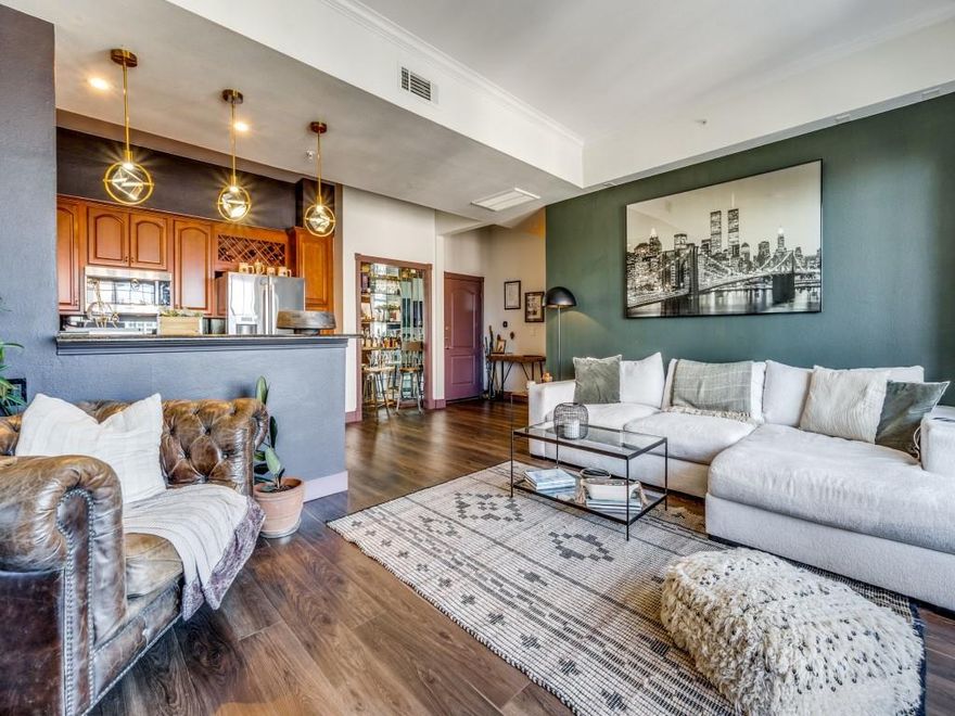 Welcome to a highly coveted Corner Unit at The Renaissance on Turtle Creek — one of the building’s larger floorplans and beautifully positioned to capture views of Turtle Creek Park, the pool deck, and the Downtown Dallas skyline.

Extensively remodeled, this home features fresh paint, decorative lighting, Bosch stainless steel appliances, and luxury vinyl flooring throughout. The kitchen showcases granite countertops and a custom dry bar — perfect for entertaining.

Wake up to Downtown skyline views from the spacious primary suite, complete with a large walk-in closet featuring a custom organization system. The primary bath offers designer updates and separate vanities. The guest suite includes its own walk-in closet and walk-in shower, plus a built-in Murphy bed for flexible use.

Enjoy indoor-outdoor living on the generous private balcony. Refrigerator, Electrolux washer, and dryer convey, making this an effortless lock-and-leave lifestyle.

Resort-style amenities include two pools, 24-hour concierge with valet, fitness centers, business centers, and guest suites. Unmatched access to Katy Trail, West Village, Uptown, Downtown, Oak Lawn, and the Arts District completes the experience.