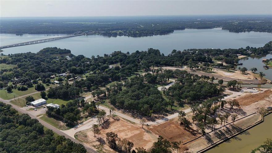 Welcome to Emerald Bay at Cedar Creek Lake! Where luxury meets natural serenity, Emerald Bay offers a remarkable community featuring only 71 exclusive homesites meticulously crafted across 44 stunning acres. Here, you can choose from both waterfront and interior homesite options, making it your chance to call this exceptional subdivision home—just over 1 hour east of downtown Dallas. Immerse yourself in a naturally inspired lake lifestyle at Emerald Bay, where your amenities embody the perfect intersection of nature and luxury. Life at Emerald Bay revolves around the refreshing waters of Cedar Creek Lake. Lot 9 ON 133' OF WATERFRONT! INQUIRE ABOUT SELLERS CONCESSION!

Amenities at Emerald Bay:
- Stunning Swimming Pool: Designed for leisure, the pool is perfect for swimming laps or lounging poolside, offering a peaceful retreat.
- Pickleball Courts: Stay active on our state-of-the-art pickleball courts.
- Basketball Courts: Shooting hoops at our well-maintained basketball courts.
- Playground: Designed for family fun and adventure. 
- Fire Pit: Enjoy cozy evenings around the fire pit, perfect for cooler nights while surrounded by the beauty of nature.
- Golf Cart Trails: Scenic golf cart paths throughout Emerald Bay, to navigate the community and connect with neighbors. 

This gated community boasts concrete roads, curb and gutter, underground utilities, street lighting, private water, private sewer, and fiber optic connections. With deed restrictions and architectural guidelines for builders, Emerald Bay is a roadmap to a luxurious lifestyle, offering both elegance and comfort.Emerald Bay is not only a stunning community but also conveniently located just a 10-minute drive away from the prestigious Pinnacle Golf Club. This 18-hole championship golf course has been voted the 8th best in Texas, making it a premier destination for golf enthusiasts.  
Being so close to Pinnacle Golf Club adds an exceptional layer to the Emerald Bay lifestyle.