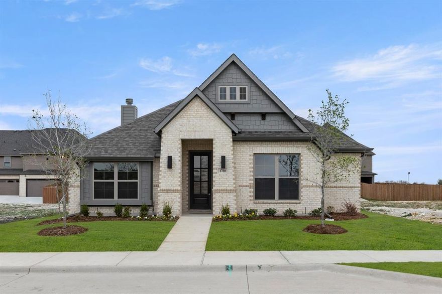 MLS# 21033737 - Built by J Houston Homes - Ready Now! ~ Discover modern living in this stunning 4-bedroom, 2-bathroom single-family residence located in The Retreat, part of the Waxahachie ISD. This contemporary home, built in 2025, offers a spacious 1,753 sq ft layout featuring a cozy wood-burning fireplace, decorative lighting, and a thoughtfully designed open concept. The kitchen seamlessly connects to the single dining area and the inviting living space, perfect for gatherings. Enjoy outdoor relaxation on the covered patio, surrounded by minimal trees and a well-maintained sprinkler system. The home includes a two-car garage, central electric heating and cooling, and a durable composition roof. Don't miss the opportunity to make this your dream home in a desirable community!