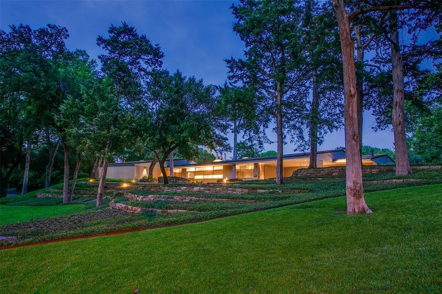 Imagine a home where Mother Nature herself played architect, planting it firmly on solid rock within a nature sanctuary, established 115 years ago. This Prinz and Brooks Mid-Century Modern dream, in Frank Lloyd Wright style, floats above a spring-fed lake, offering serene luxury, moments to downtown. A masterpiece that winks at you with elegance, innovation. Inside, rich walnut paneling and travertine floors wrap you in a warm embrace. Sunlight floods panoramic windows, blurring the line between indoor charm and outdoor splendor. The chef's kitchen is a culinary playground, featuring top-tier appliances, begging for your next gourmet creation. The primary suite is a romantic hideaway, complete with a balcony view that makes every morning feel magical. Outside, manicured gardens and sparkling pool nestle into the rolling hills. Two guest quarters reno ready. With only 2 owners in 68 years, the Hayes-Bernstein residence is a once-in-a-generation opportunity to be a guardian of history