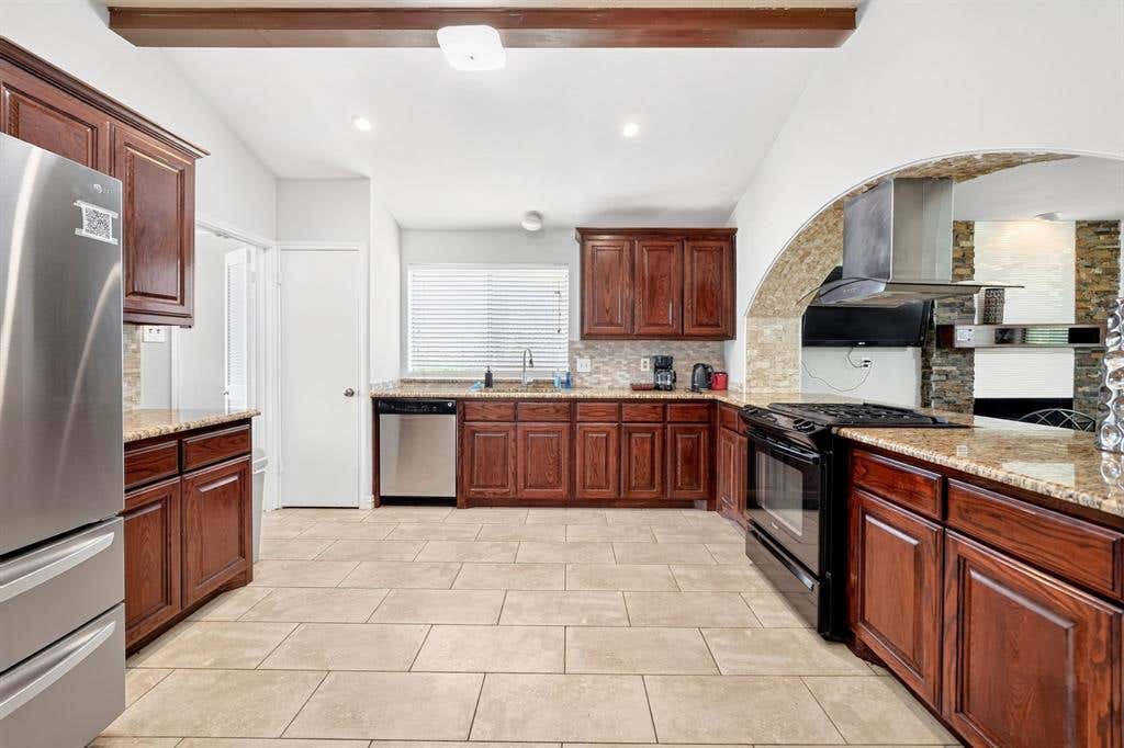 Photo of 310 Overland Drive, Garland, TX 75040 (MLS # 21306942)