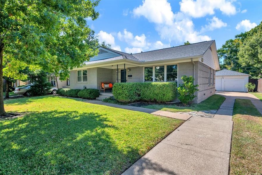 Picturesque mid-century modern home in the highly sought-after Lochwood neighborhood near White Rock Lake. This beautifully maintained 3-bedroom home features rich wood flooring throughout—no carpet—and a striking wood accent wall in the living and dining areas that creates a stunning first impression. The updated kitchen boasts white cabinetry, granite countertops, stone backsplash, stainless steel appliances, and a custom island with wine fridge, storage, and bar seating—perfect for entertaining. Major updates and improvements include: electrical panel and breakers (2025), Low-E windows, updated lighting, high-efficiency HVAC (2020), roof replacement (2020), new garage door opener (2024), and an electric vehicle (EV) charging outlet in the garage—a rare convenience for modern homeowners. The home is gas-appliance compatible and includes a Ring security system. Enjoy a spacious backyard with lush grass, a newer fence, and plenty of space for pets or outdoor gatherings. Just a short walk to Lochwood Park with new pickleball courts, wooded walking trails, tennis courts, and multiple playgrounds. Conveniently located minutes from White Rock Lake, the Dallas Arboretum, Lakewood, Lower Greenville, Casa Linda, and Lake Highlands—offering endless shopping, dining, and entertainment options. The home sits across from the brand-new Martha Turner Reilly Elementary School, which features security cameras facing the property for added peace of mind and neighborhood safety.