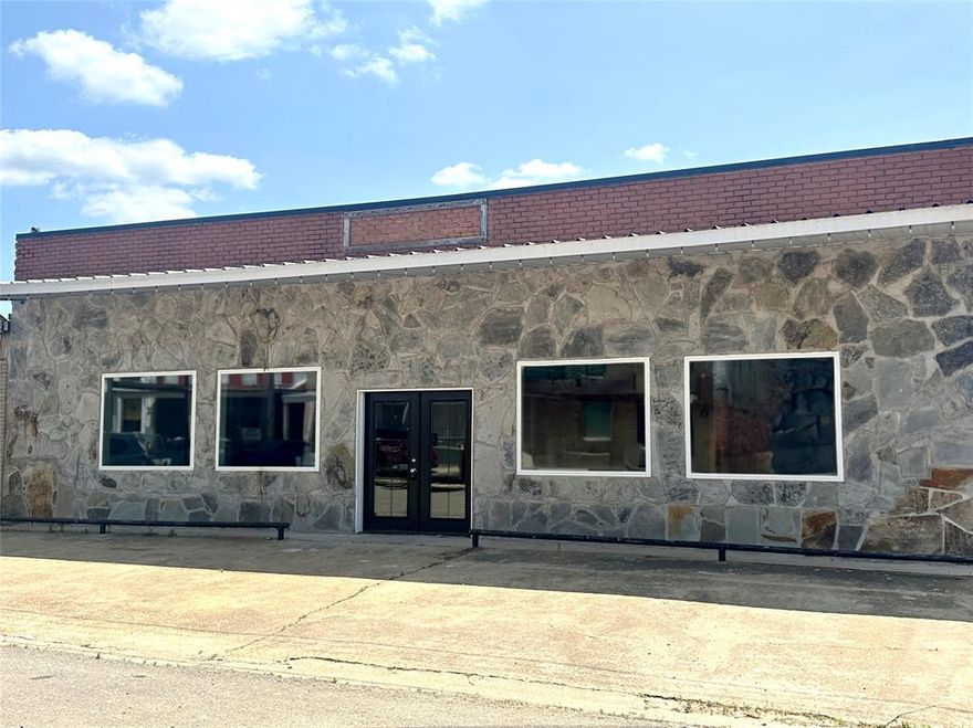 Recently remodeled multi-purpose Commercial Property! This 5600 sq ft property was formerly used as a retail business and a wedding and event center.  In addition to the large open area at the front of the building, there is a large warehouse area in the back with a overhead loading door in the alley. There are also restrooms, and  multiple rooms at the back of the building for storage or prep work.