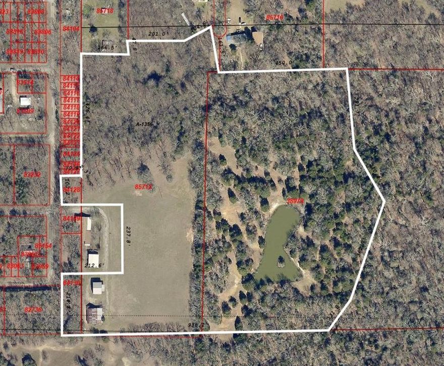 Escape to your own private sanctuary with this remarkable 21 acre property, offering a perfect blend of natural beauty. Many spots to build a home