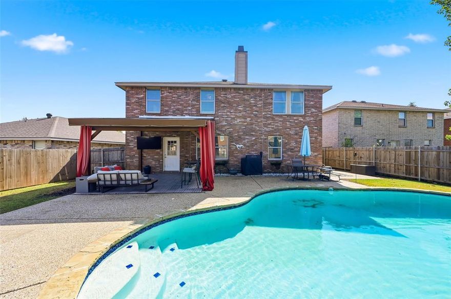 Welcome to 605 Jagera Way, a beautifully updated 5-bedroom, 3-bath home with pool in the highly desired Mansfield ISD!
This spacious 3,700 sq ft home offers a bright, open layout and tasteful modern updates throughout. Enjoy fresh custom interior paint, updated flooring, and an inviting living area centered around a white-stone fireplace with crown molding and natural light. 
The remodeled kitchen features new granite countertops, a sleek glass tile backsplash, painted cabinetry, and updated appliances, all flowing seamlessly into the dining and living spaces—perfect for entertaining. The downstairs guest suite and full bath offer flexibility for visitors or a home office. Upstairs, the expansive primary retreat includes dual walk-in closets, a private study, and a completely renovated spa-style bath with an oversized custom-built shower featuring jet body sprayers and elegant tile finishes. The secondary bedrooms are spacious and complemented by a large game room ideal for media, exercise, or play.
Step outside to a covered patio with recent upgrades, overlooking a sparkling pool with waterfall and a private backyard built for relaxation.
Additional highlights include updated lighting, flooring, appliances, and a two-car garage. Conveniently located near highways 360 and 287 for an easy commute, and minutes from top-rated Mansfield schools, shopping, and dining.
Stylish, move-in ready, and loaded with upgrades — this home truly has it all!