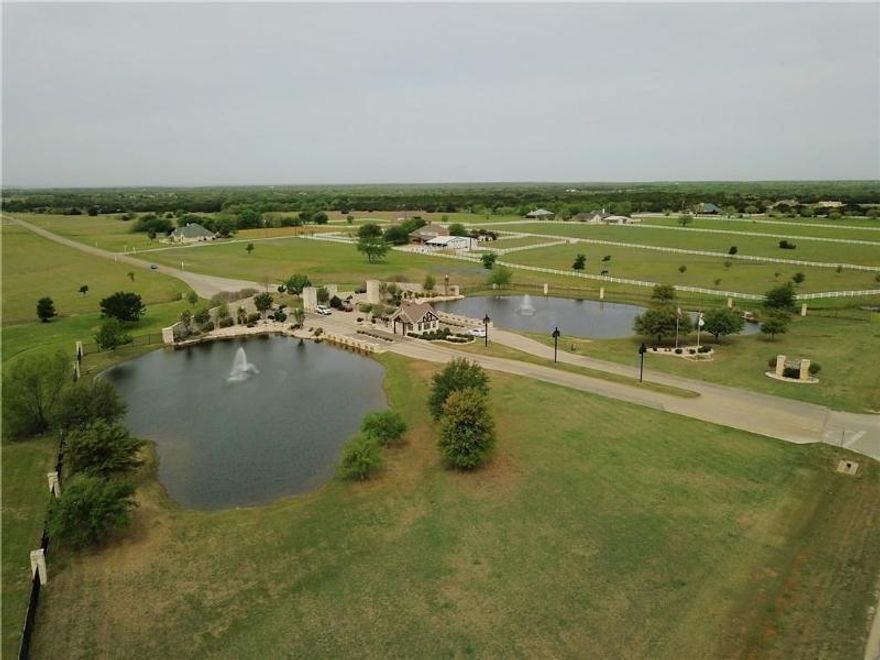 Build your dream home or purchase a lot at White Bluff Resort, just 1.5 hours from DFW or Waco. Enjoy amenities like golf, fishing, hiking, pools, lake access, parks, and catch-and-release ponds. Membership includes rounds on two golf courses, access to four pools, tennis courts, restaurants, a marina, boat ramps, cabins, condos, and a hotel—all in a scenic community with abundant wildlife.